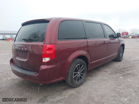 2019 Dodge Grand Caravan SE with VIN 2C4RDGBG1KR521851, listed as a IAAI auction lot 41572267 with 104,484 mi miles. Bid and sale history available at carsss.com. Image 4.