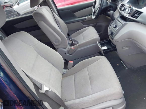2016 Honda Odyssey LX z VIN 5FNRL5H21GB082236, wystawiony jako IAAI lot #42162790 z przebiegiem 78 318 mil mil oraz . Historia ofert i sprzedaży dostępna na DreamBid. Obrazek 5.