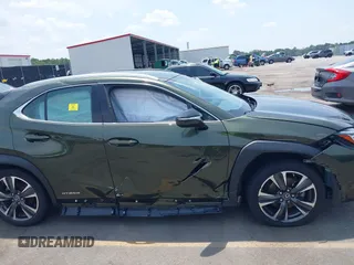 2020 Lexus UX 250h with VIN JTHX9JBH8L2033882, listed as a IAAI auction lot 42562160 with 62,848 mi miles and . Bid and sale history available at DreamBid. Image 14.
