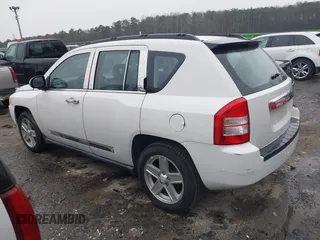2007 Jeep Compass Sport with VIN 1J8FT47W27D256252, listed as a IAAI auction lot 41616554 with 210,125 mi miles. Bid and sale history available at carsss.com. Image 3.