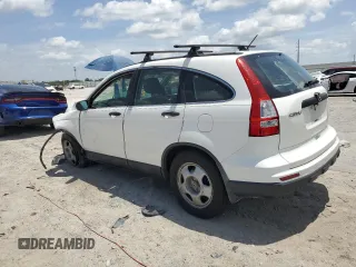 2011 Honda CR-V LX z VIN 5J6RE3H36BL002792, wystawiony jako Copart lot #60259625 z przebiegiem 187 591 mil mil oraz Czysty tytuł • Clean title. Historia ofert i sprzedaży dostępna na DreamBid. Obrazek 2.