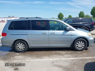 2010 Honda Odyssey EX with VIN 5FNRL3H44AB059711, listed as a IAAI auction lot 42057760 with 225,486 mi miles and . Bid and sale history available at DreamBid. Image 13.