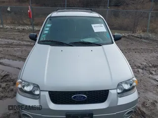 2006 Ford Escape Hybrid with VIN 1FMCU96H16KB20756, listed as a IAAI auction lot 41223286 with 101,829 mi miles and . Bid and sale history available at DreamBid. Image 6.
