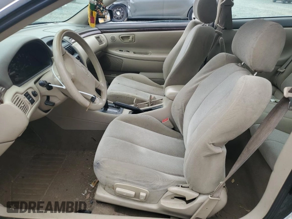 1999 Toyota Solara SE with VIN 2T1CG22PXXC169800, listed as a Copart auction lot 48295215 with 203,587 mi miles and Salvage Title. Bid and sale history available at DreamBid. Image 7.