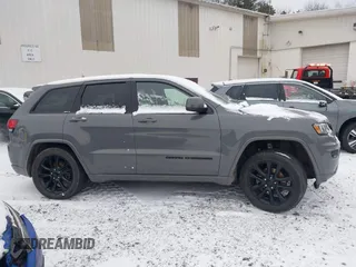 2020 Jeep Grand Cherokee Laredo E with VIN 1C4RJFAG9LC291300, listed as a IAAI auction lot 41315443 with 29,979 mi miles and . Bid and sale history available at DreamBid. Image 13.