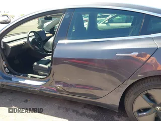 2019 Tesla Model 3 Long Range with VIN 5YJ3E1EB9KF386047, listed as a IAAI auction lot 42215362 with 41,246 mi miles and . Bid and sale history available at DreamBid. Image 15.