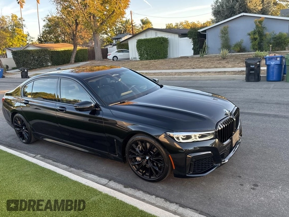 2022 BMW 7 Series 750i xDrive with VIN WBA7U2C02NCH89848, listed as a Copart auction lot 84766184 with 19,758 mi miles and Salvage title. Bid and sale history available at DreamBid. Image 1.