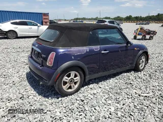 2005 MINI Convertible z VIN WMWRF33435TF61157, wystawiony jako Copart lot #54304905 z przebiegiem Nie podano mil oraz Szkoda całkowita • Salvage title. Historia ofert i sprzedaży dostępna na DreamBid. Obrazek 3.