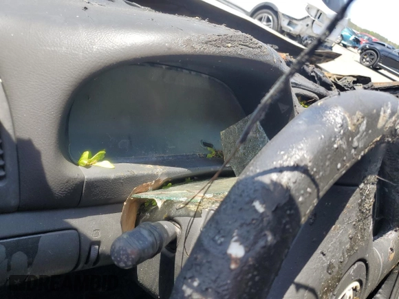 2004 Toyota Camry LE z VIN JTDBE32K740250691, wystawiony jako Copart lot #55793225 z przebiegiem Nie podano mil oraz Szkoda całkowita • Salvage title. Historia ofert i sprzedaży dostępna na DreamBid. Obrazek 9.