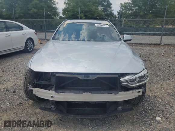 2017 BMW 3 Series 330i xDrive with VIN WBA8K3C57HK678988, listed as a Copart auction lot 65394344 with 67,918 mi miles and Salvage Title. Bid and sale history available at carsss.com. Image 5.