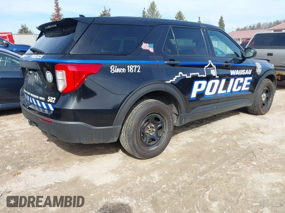2020 Ford Police Interceptor Utility z VIN 1FM5K8AB2LGC51317, wystawiony jako IAAI lot #41755681 z przebiegiem 102 945 mil mil oraz . Historia ofert i sprzedaży dostępna na DreamBid. Obrazek 4.