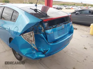 2011 Honda Insight LX z VIN JHMZE2H50BS009095, wystawiony jako IAAI lot #41261525 z przebiegiem 188 441 mil mil oraz . Historia ofert i sprzedaży dostępna na DreamBid. Obrazek 13.