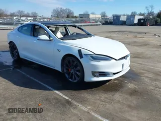 2020 Tesla Model S Performance with VIN 5YJSA1E47LF404443, listed as a IAAI auction lot 41284517 with 41,590 mi miles and . Bid and sale history available at DreamBid. Image 1.