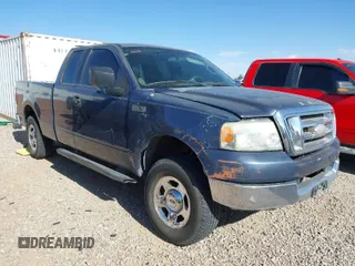 2004 Ford F-150 STX with VIN 1FTRX12W04NB12848, listed as a IAAI auction lot 42000588 with 109,401 mi miles. Bid and sale history available at carsss.com. Image 1.