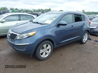 2013 Kia Sportage LX with VIN KNDPB3A26D7452008, listed as a IAAI auction lot 42435597 with 109,397 mi miles and . Bid and sale history available at DreamBid. Image 2.