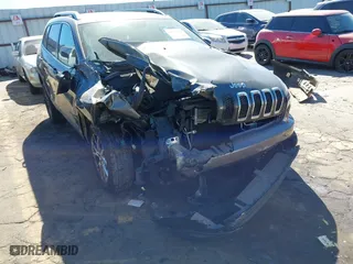 2014 Jeep Cherokee Latitude with VIN 1C4PJLCB1EW153825, listed as a IAAI auction lot 41675220 with 208,943 mi miles. Bid and sale history available at carsss.com. Image 17.