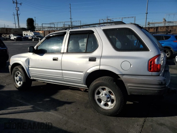 2000 Isuzu Rodeo S z VIN 4S2CK58W2Y4311726, wystawiony jako Copart lot #85070364 z przebiegiem 226 510 mil mil oraz Szkody całkowita. Historia ofert i sprzedaży dostępna na DreamBid. Obrazek 2.