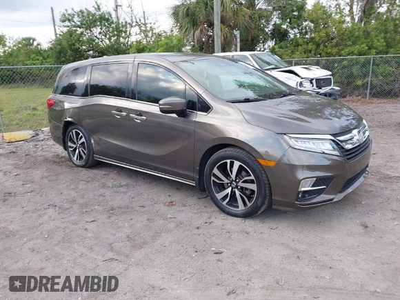 2020 Honda Odyssey Elite with VIN 5FNRL6H91LB030294, listed as a IAAI auction lot 41608291 with 74,477 mi miles and . Bid and sale history available at DreamBid. Image 1.