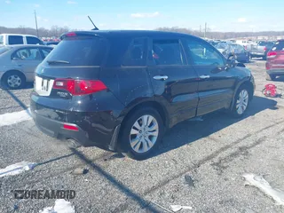 2010 Acura RDX with VIN 5J8TB1H29AA006461, listed as a IAAI auction lot 41321754 with 165,000 mi miles. Bid and sale history available at carsss.com. Image 4.