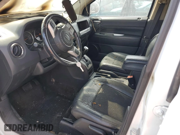 2016 Jeep Compass Latitude z VIN 1C4NJDEB6GD594486, wystawiony jako Copart lot #53440825 z przebiegiem Nie podano mil oraz Szkoda całkowita • Salvage title. Historia ofert i sprzedaży dostępna na DreamBid. Obrazek 7.