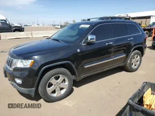 2013 Jeep Grand Cherokee Overland with VIN 1C4RJFCG5DC638927, listed as a Copart auction lot 52752615 with 117,494 mi miles and Salvage Title. Bid and sale history available at carsss.com. Image 1.