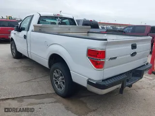 2014 Ford F-150 XL with VIN 1FTMF1CMXEKE52148, listed as a IAAI auction lot 41648885 with 273,189 mi miles. Bid and sale history available at carsss.com. Image 3.