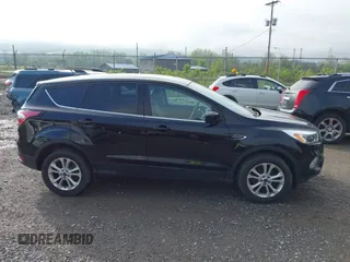 2017 Ford Escape SE with VIN 1FMCU9GD0HUC62616, listed as a IAAI auction lot 42194561 with 97,897 mi miles and . Bid and sale history available at DreamBid. Image 13.
