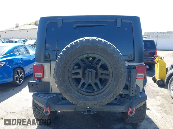 2017 Jeep Wrangler Unlimited Sahara with VIN 1C4BJWEG1HL746854, listed as a IAAI auction lot 41948127 with 97,730 mi miles. Bid and sale history available at carsss.com. Image 16.