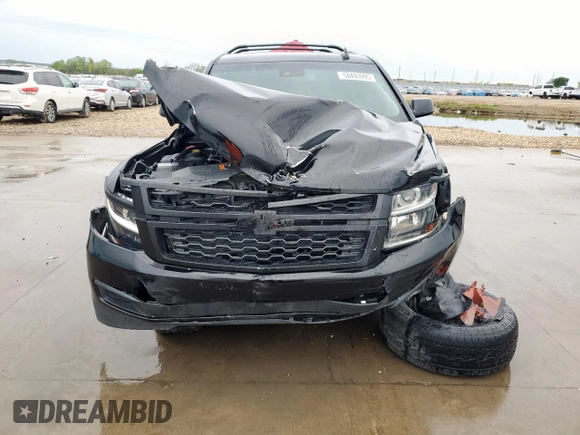 2018 Chevrolet Tahoe LT with VIN 1GNSCBKC3JR351640, listed as a Copart auction lot 50493995 with 135,603 mi miles and Salvage title. Bid and sale history available at DreamBid. Image 5.