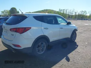 2018 Hyundai Santa Fe 2.4L z VIN 5NMZTDLB3JH090748, wystawiony jako IAAI lot #42145245 z przebiegiem 112 314 mil mil oraz . Historia ofert i sprzedaży dostępna na DreamBid. Obrazek 4.
