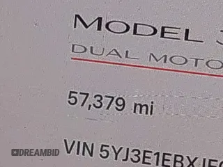 2018 Tesla Model 3 Long Range Battery with VIN 5YJ3E1EBXJF055203, listed as a IAAI auction lot 42019770 with 57,379 mi miles and . Bid and sale history available at DreamBid. Image 15.