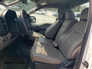 2019 Ford F-150 XL with VIN 1FTMF1CB9KKE43869, listed as a Copart auction lot 57331515 with 164,061 mi miles and Salvage title. Bid and sale history available at DreamBid. Image 7.