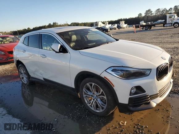 2018 BMW X2 sDrive28i with VIN WBXYJ3C3XJEJ81736, listed as a Copart auction lot 87390404 with 165,522 mi miles and Salvage Title. Bid and sale history available at carsss.com. Image 4.