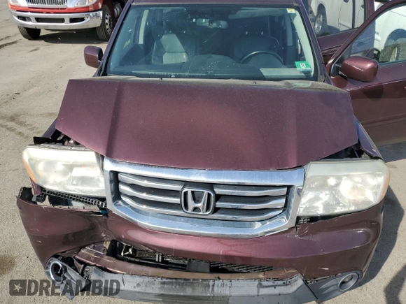 2015 Honda Pilot EX-L z VIN 5FNYF4H54FB029066, wystawiony jako Copart lot #54774505 z przebiegiem Nie podano mil oraz Szkoda całkowita • Salvage title. Historia ofert i sprzedaży dostępna na DreamBid. Obrazek 12.