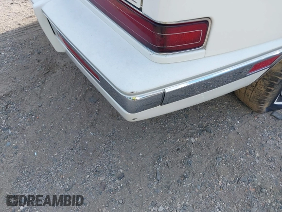 1991 Cadillac Seville z VIN 1G6KS53B9MU820155, wystawiony jako IAAI lot #40035441 z przebiegiem 78 021 mil mil oraz . Historia ofert i sprzedaży dostępna na DreamBid. Obrazek 13.