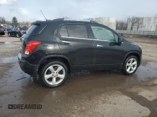 2016 Chevrolet Trax LTZ with VIN KL7CJRSB2GB562166, listed as a Copart auction lot 50413105 with 57,058 mi miles and Salvage Title. Bid and sale history available at carsss.com. Image 3.