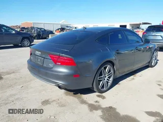 2014 Audi A7 3.0 Prestige with VIN WAU2GAFC8EN066864, listed as a IAAI auction lot 41629789 with 89,269 mi miles. Bid and sale history available at carsss.com. Image 4.