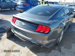 2020 Ford Mustang EcoBoost with VIN 1FA6P8TH3L5169920, listed as a IAAI auction lot 42339107 with 84,748 mi miles and . Bid and sale history available at DreamBid. Image 4.