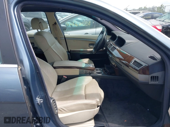 2006 BMW 7 Series 750Li z VIN WBAHN83576DT62514, wystawiony jako IAAI lot #42657343 z przebiegiem Nie podano mil oraz . Historia ofert i sprzedaży dostępna na DreamBid. Obrazek 5.