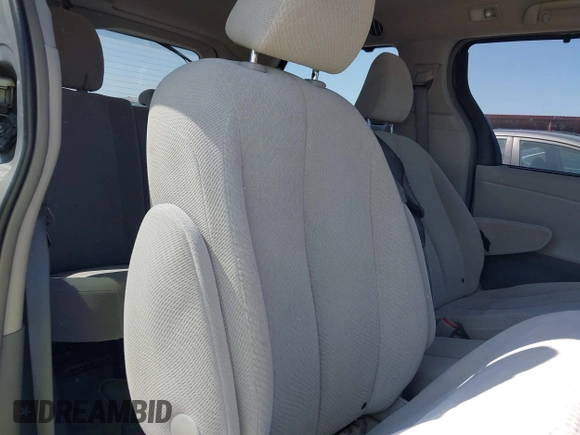 2014 Toyota Sienna LE AAS with VIN 5TDKK3DC4ES447265, listed as a IAAI auction lot 42024631 with 112,890 mi miles and . Bid and sale history available at carsss.com. Image 8.