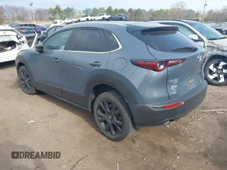 2023 Mazda CX-30 S Carbon Edition with VIN 3MVDMBCM8PM502891, listed as a IAAI auction lot 42050533 with 20,035 mi miles and . Bid and sale history available at DreamBid. Image 3.
