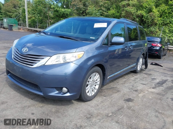 2016 Toyota Sienna XLE with VIN 5TDYK3DC0GS766059, listed as a IAAI auction lot 42214738 with 143,001 mi miles and . Bid and sale history available at DreamBid. Image 2.