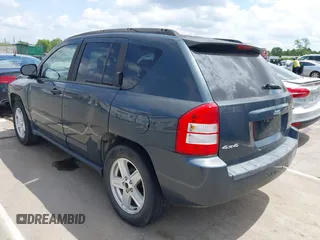 2007 Jeep Compass Sport with VIN 1J8FF47W17D597598, listed as a IAAI auction lot 42157027 with 153,043 mi miles and . Bid and sale history available at carsss.com. Image 3.