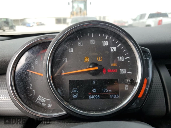 2021 MINI Hardtop 4 Door Oxford Edition z VIN WMWXU7C08M2N49721, wystawiony jako Copart lot #77983324 z przebiegiem 64 096 mil mil oraz Szkoda całkowita • Salvage title. Historia ofert i sprzedaży dostępna na DreamBid. Obrazek 9.