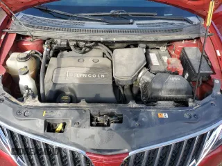2013 Lincoln MKX z VIN 2LMDJ8JK5DBL11442, wystawiony jako Copart lot #46967715 z przebiegiem 192 409 mil mil oraz Szkoda całkowita • Salvage title. Historia ofert i sprzedaży dostępna na DreamBid. Obrazek 11.