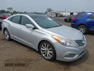 2014 Hyundai Azera Limited z VIN KMHFH4JG0EA396451, wystawiony jako IAAI lot #42493447 z przebiegiem 166 810 mil mil oraz . Historia ofert i sprzedaży dostępna na DreamBid. Obrazek 1.