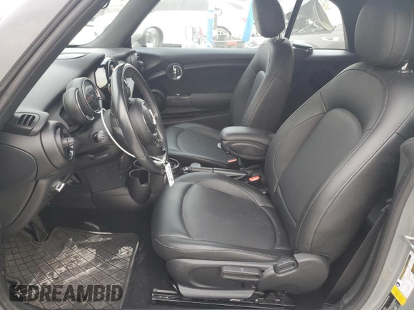 2019 MINI Convertible Cooper z VIN WMWWG5C51K3F79995, wystawiony jako Copart lot #48365685 z przebiegiem 74 357 mil mil oraz Szkoda całkowita • Salvage title. Historia ofert i sprzedaży dostępna na DreamBid. Obrazek 7.