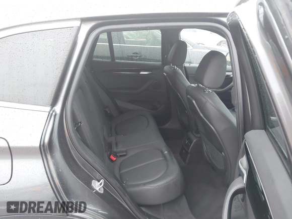 2019 BMW X1 sDrive28i with VIN WBXHU7C52K5L12160, listed as a IAAI auction lot 41452244 with 59,344 mi miles and . Bid and sale history available at DreamBid. Image 8.