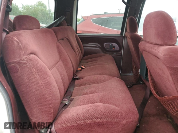 1997 GMC Suburban z VIN 1GKGK26JXVJ715765, wystawiony jako Copart lot #73188284 z przebiegiem 301 101 mil mil oraz Szkoda całkowita • Salvage title. Historia ofert i sprzedaży dostępna na DreamBid. Obrazek 11.