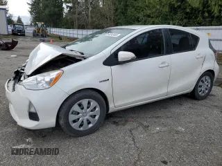 2012 Toyota Prius One z VIN JTDKDTB31C1025154, wystawiony jako Copart lot #49242465 z przebiegiem 229 714 mil mil oraz Szkoda całkowita • Salvage title. Historia ofert i sprzedaży dostępna na DreamBid. Obrazek 1.